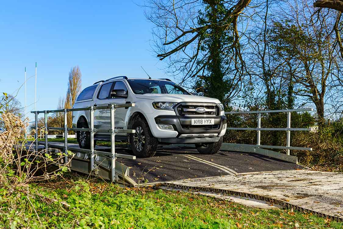 Pick Up Truck Parked On A Temporary Bridge