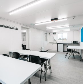 white interior of a site canteen with amenities