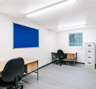 interior of a portable office cabin with furniture