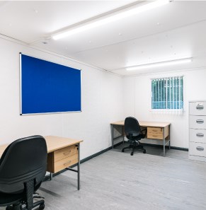 interior of a portable office cabin with furniture